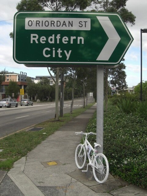 ghostbike_ws White Ghost bike chained to street sign